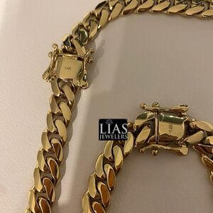 New 14k yellow gold Cuban link chain and bracelet set